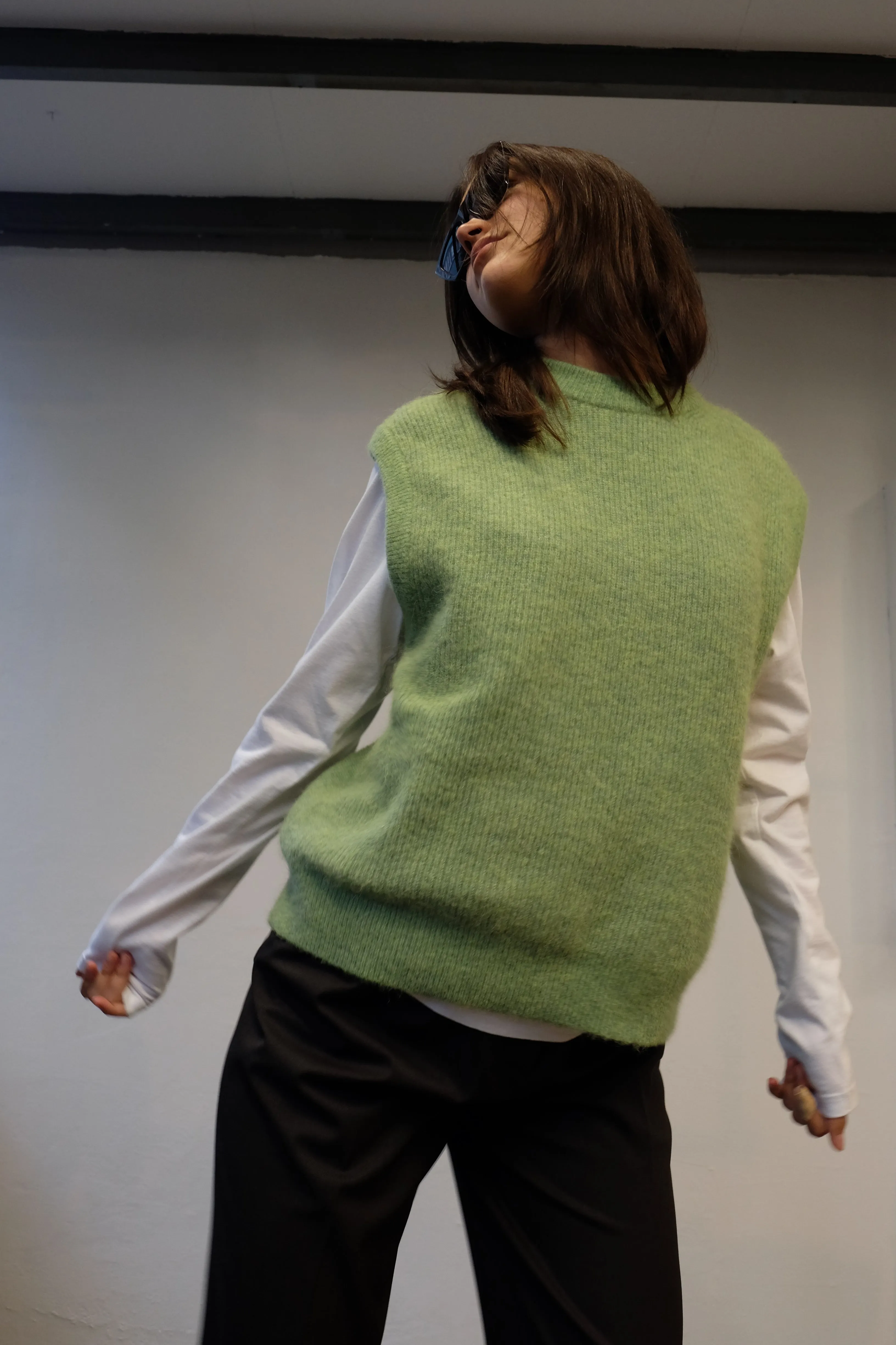 KNITTED VEST IN GREEN