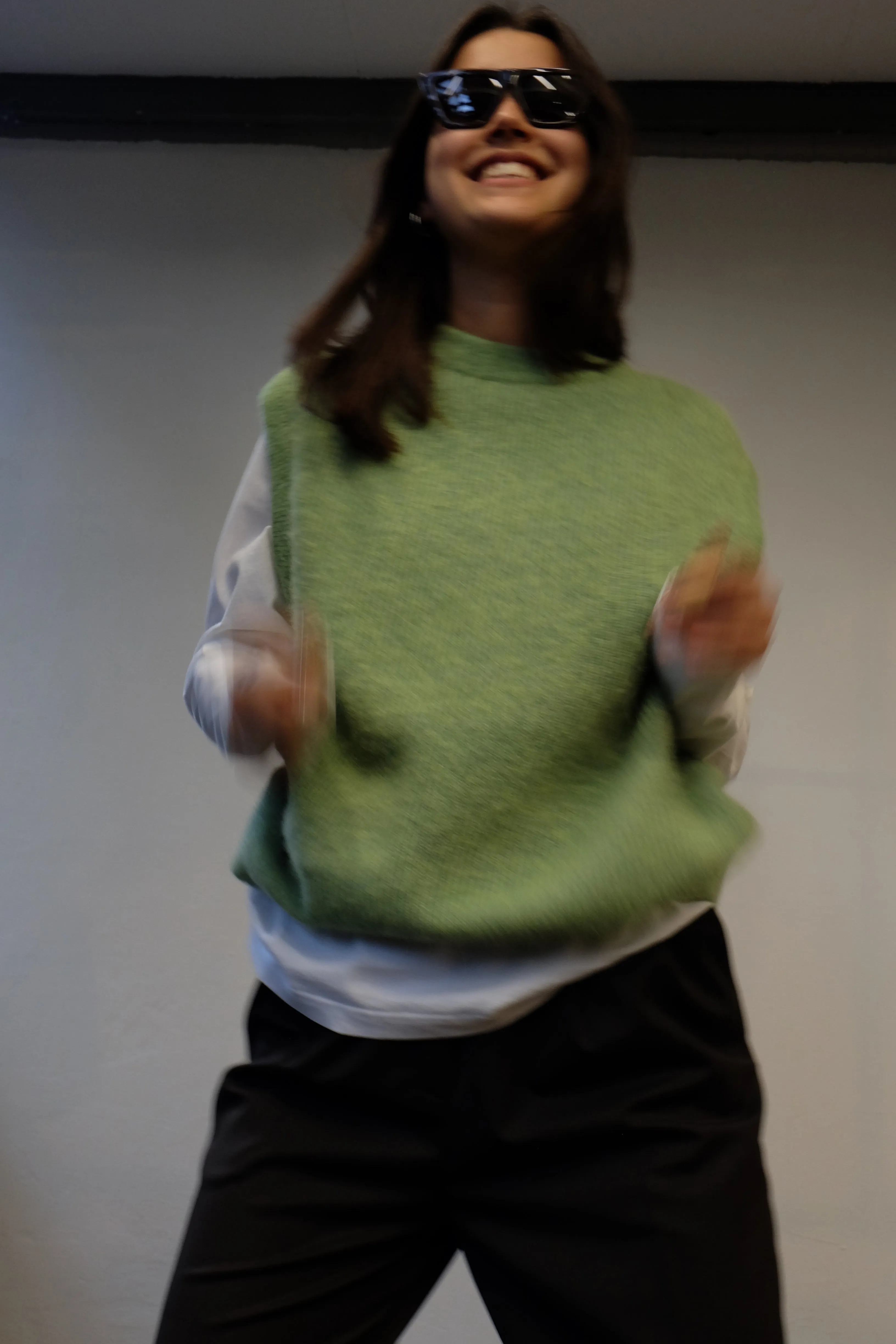 KNITTED VEST IN GREEN