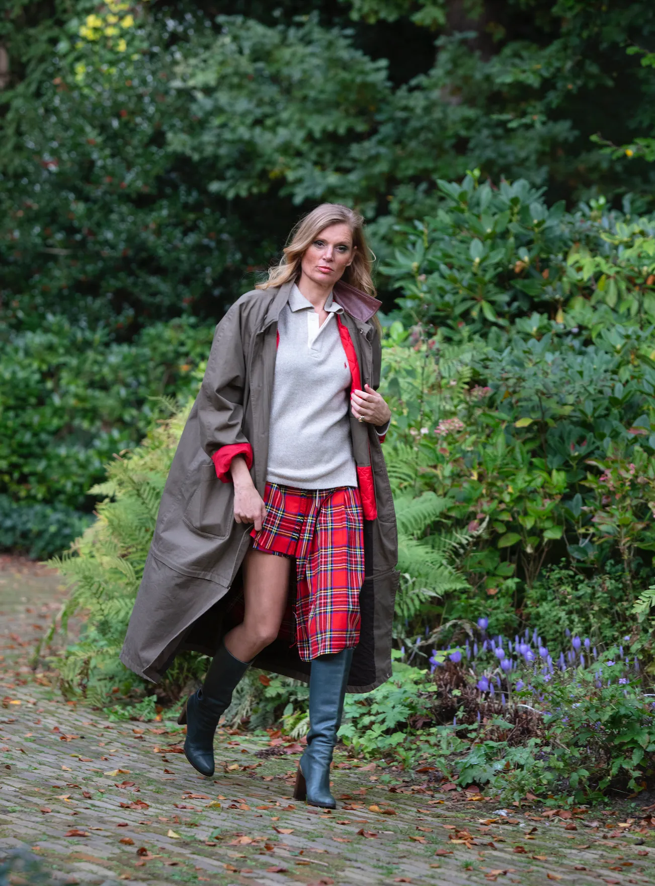 Long khaki brown vintage coat with quilted inner red jacket.