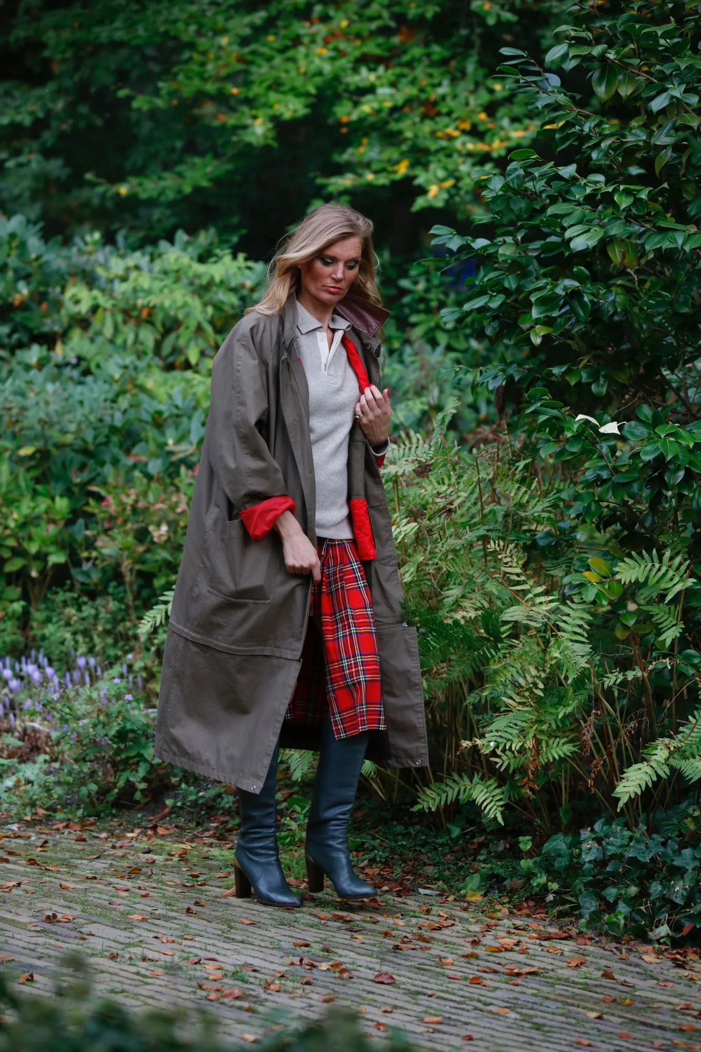 Long khaki brown vintage coat with quilted inner red jacket.